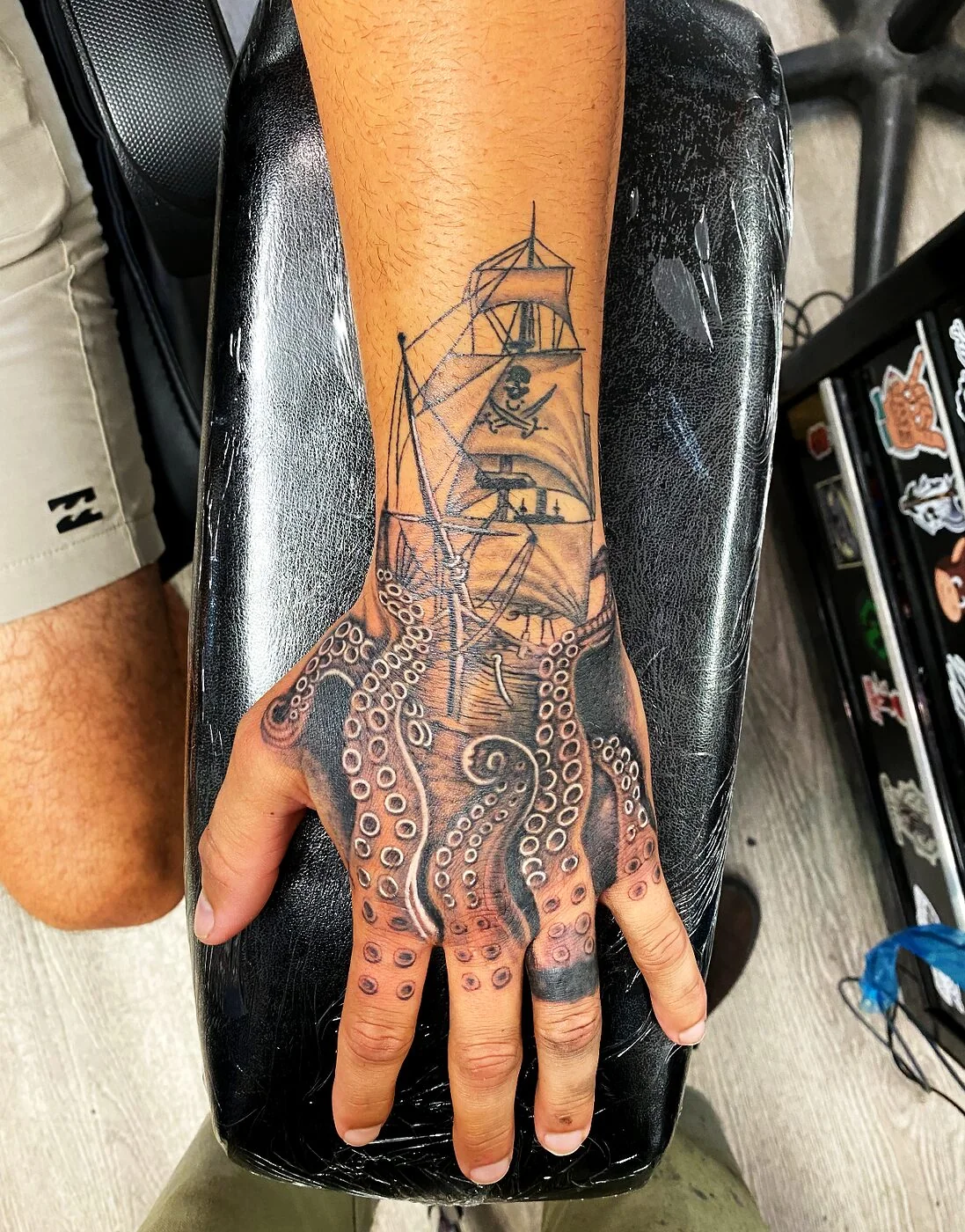 Black & Grey pirate ship with octopus tentacles tattoo on hand by 2bit (Chris Curren) at Lost at Sea Tattoo, Chinatown, Honolulu Black & Grey pirate ship with octopus tentacles tattoo on hand by 2bit (Chris Curren) at Lost at Sea Tattoo, Chinatown, Honolulu