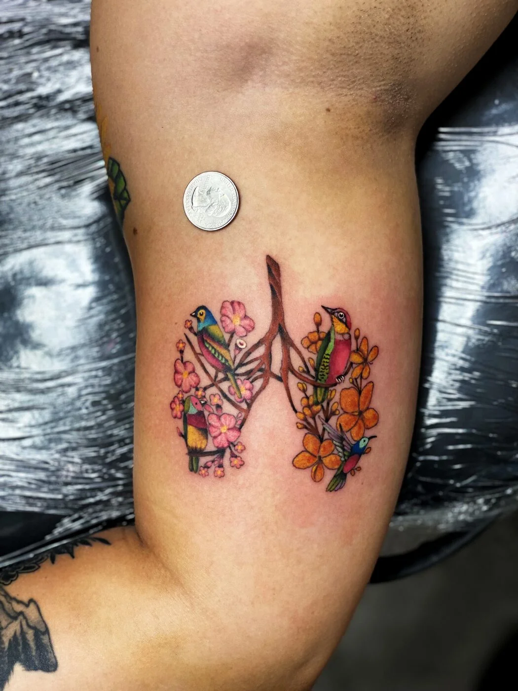 Color Realism colorful birds and flowers shaped like lungs tattoo on ribs by 2bit (Chris Curren) at Lost at Sea Tattoo, Chinatown, Honolulu Color Realism colorful birds and flowers shaped like lungs tattoo on ribs by 2bit (Chris Curren) at Lost at Sea Tattoo, Chinatown, Honolulu