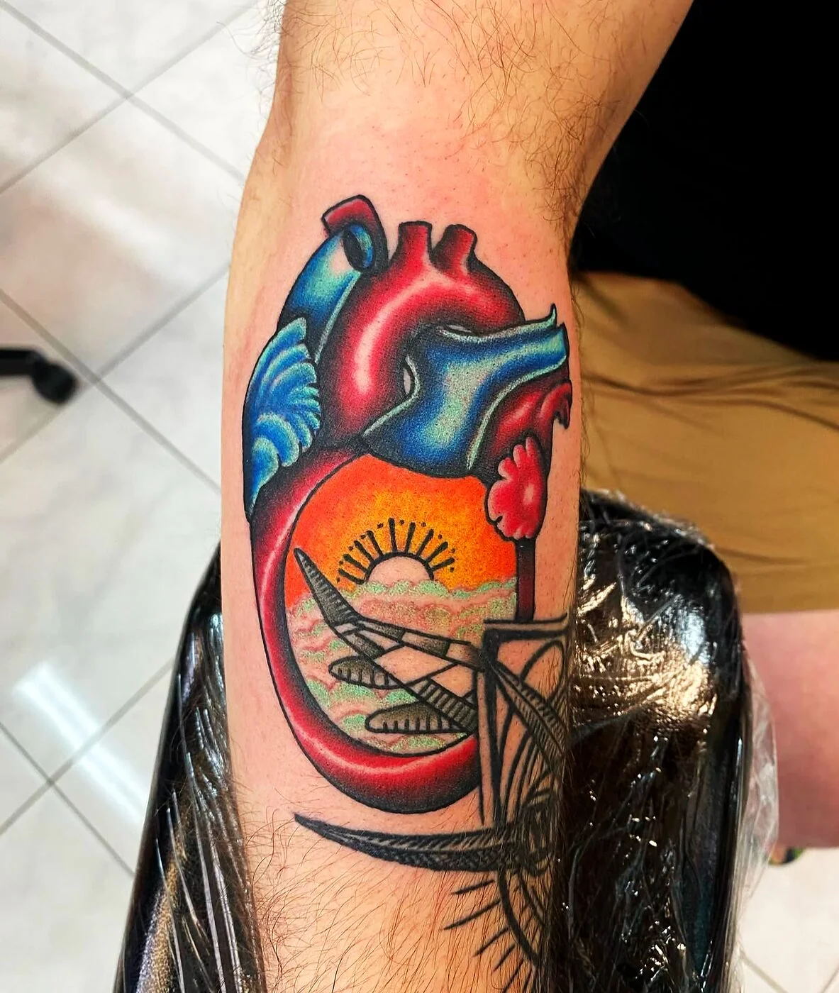 Neo-Traditional anatomical heart with sunset and palm tree inside tattoo on forearm by 2bit (Chris Curren) at Lost at Sea Tattoo, Chinatown, Honolulu Neo-Traditional anatomical heart with sunset and palm tree inside tattoo on forearm by 2bit (Chris Curren) at Lost at Sea Tattoo, Chinatown, Honolulu